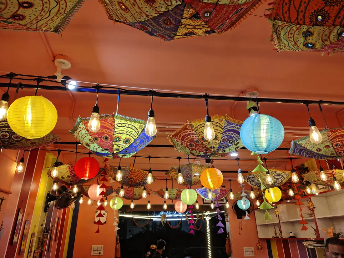 Colourful lanterns and string lights in the dining area